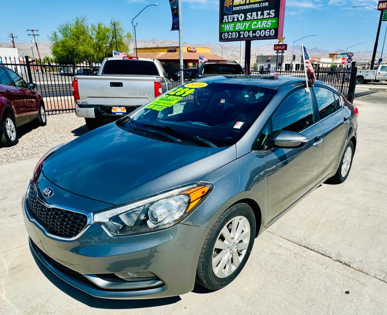2014 grey Kia Forte (KNAFX4A86E5) , located at 2190 Hwy 95, Bullhead City, AZ, 86442, (928) 704-0060, 0.000000, 0.000000 - 2014 Kia Forte EX. 2.0 4 cylinder engine. great gas mileage. new engine with warranty. great gas mileage. brand new tires. financing available. super clean. bluetooth, backup sensors. keyless entry. satellite radio. buy here pay here. in house financing . we finance. only at Dunton Motors. - Photo#3